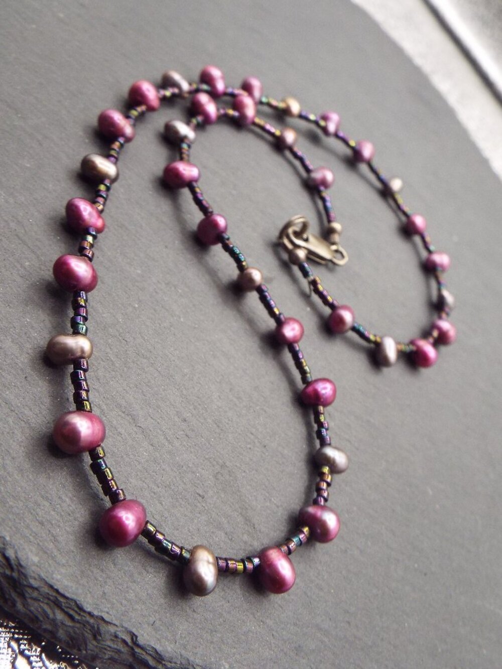 NATURAL PINK/PURPLE FRESHWATER PEARL OVALS BLACK SEED BEAD STERLING NECKLACE 56